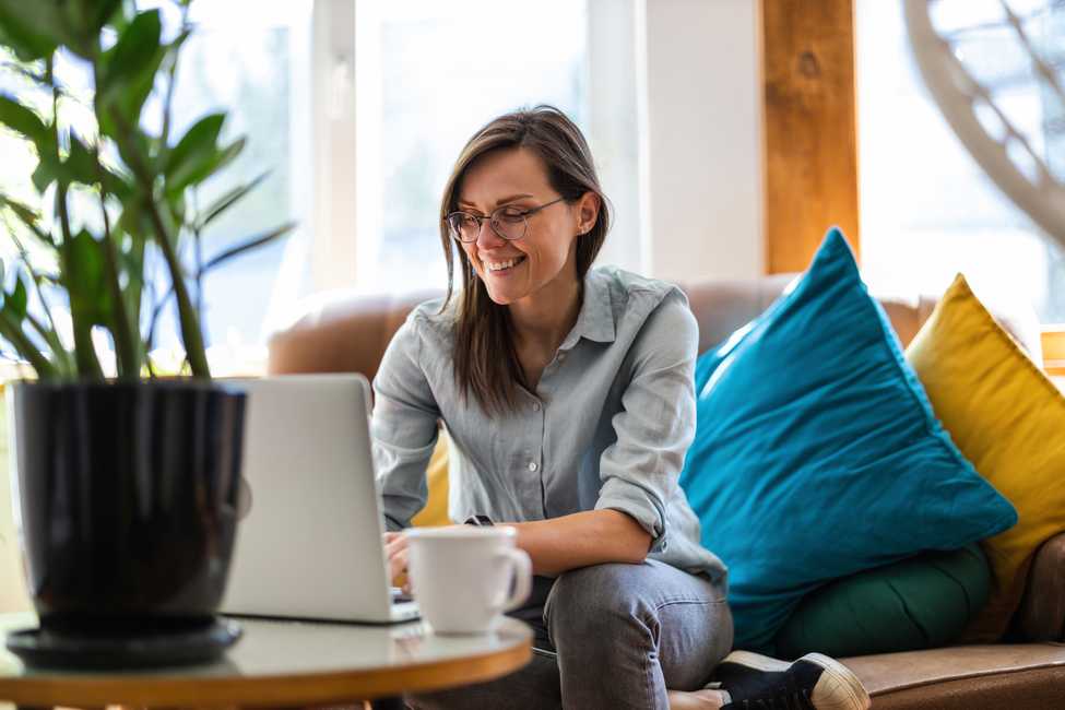 Person on laptop smiling