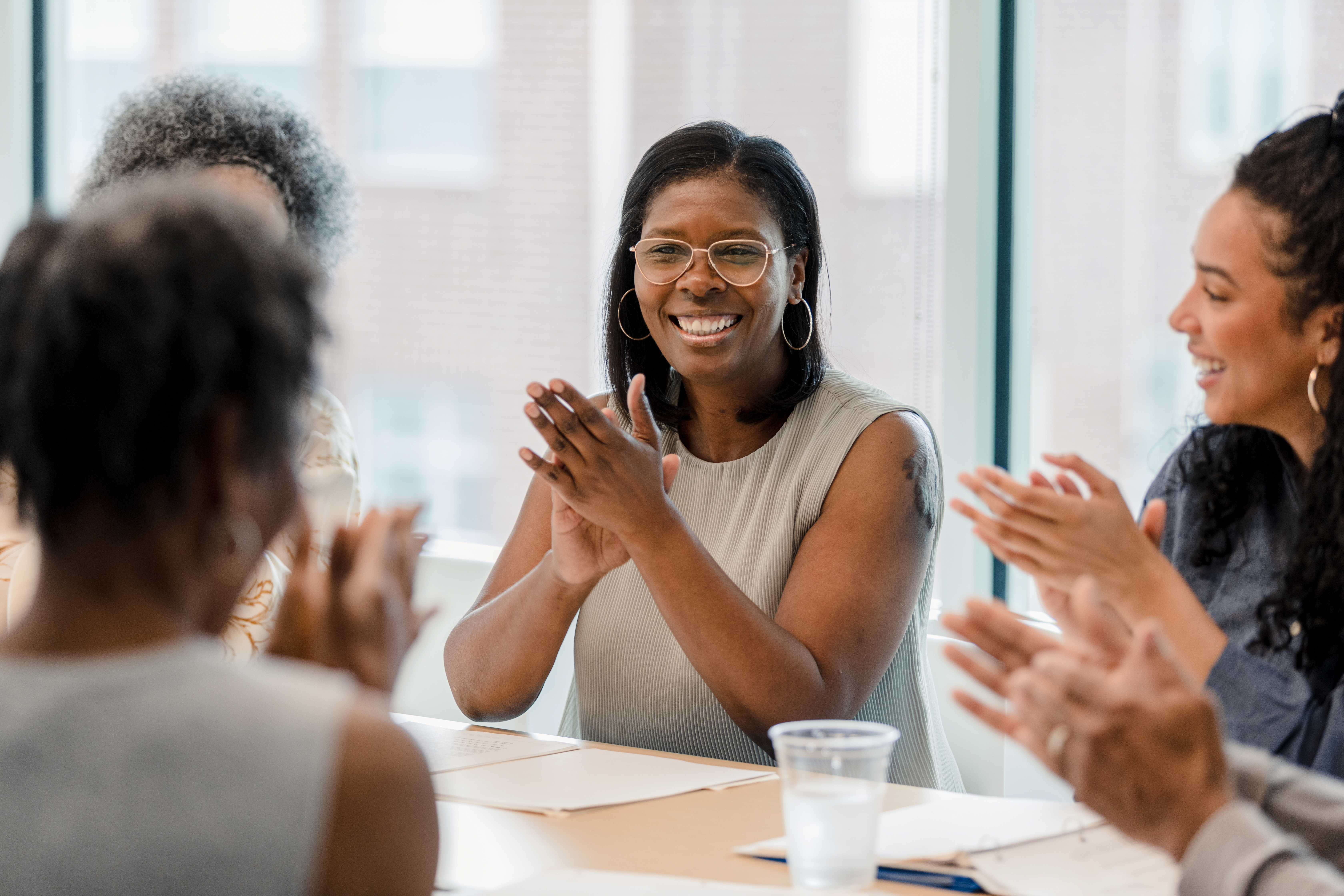 Clapping in an office meeting